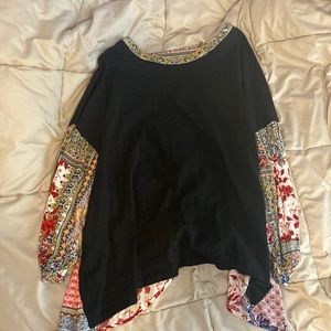 Black top with cut outs in the back